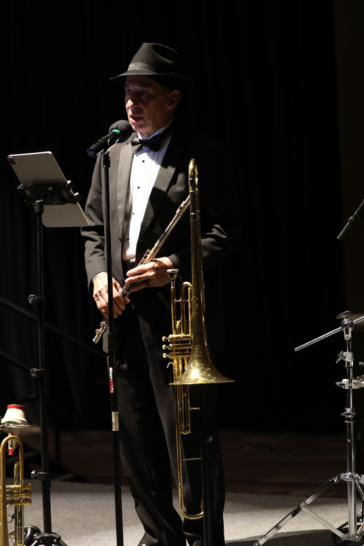 Big band with horns and rhythm section mid-performance